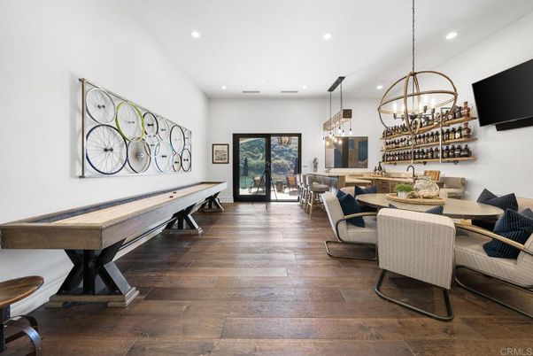 Billiard Table, Chandelier, Dining room, Game Room, Interior, Pendant Lights, Recessed Lighting, Wood Texture Flooring