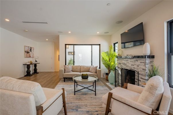 Fireplace, Interior, Living room, Recessed Lighting, Wood Texture Flooring