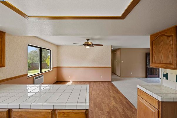 Interior, Kitchen, Tile Countertops, Wood Texture Flooring