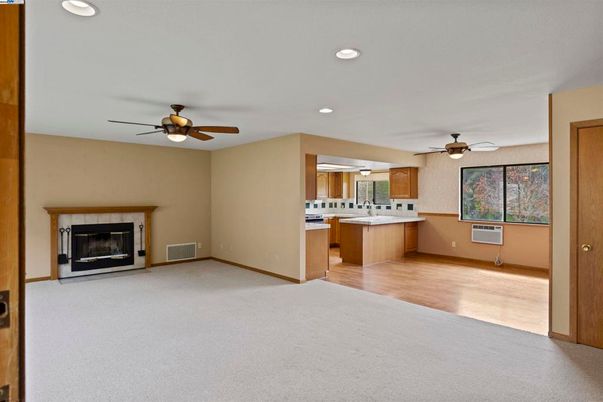 Empty room, Fireplace, Interior, Kitchen, Recessed Lighting, Wood Texture Flooring