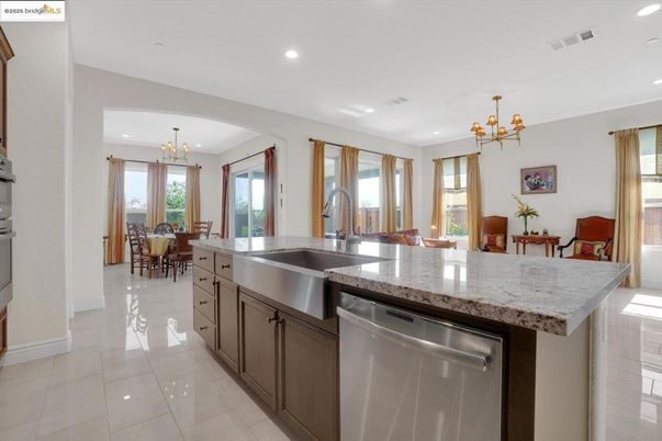 Chandelier, Dining room, Interior, Kitchen, Pendant Lights, Recessed Lighting, Stainless Steel Appliances