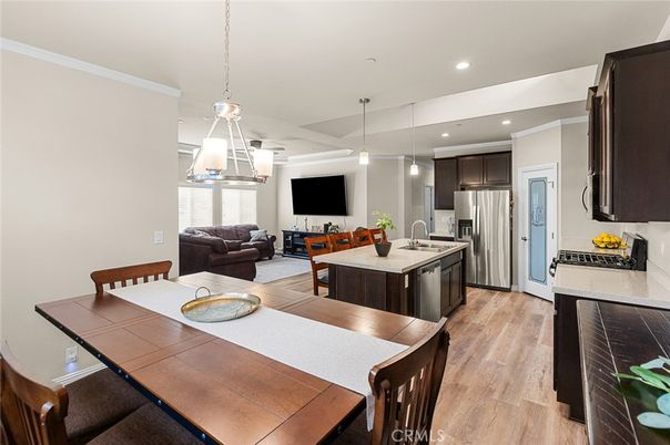 Dining room, Interior, Kitchen, Living room, Pendant Lights, Recessed Lighting, Stainless Steel Appliances, Wood Texture Flooring