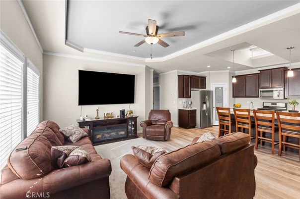 Dining room, Fireplace, Interior, Kitchen, Living room, Pendant Lights, Recessed Lighting, Stainless Steel Appliances, Wood Texture Flooring