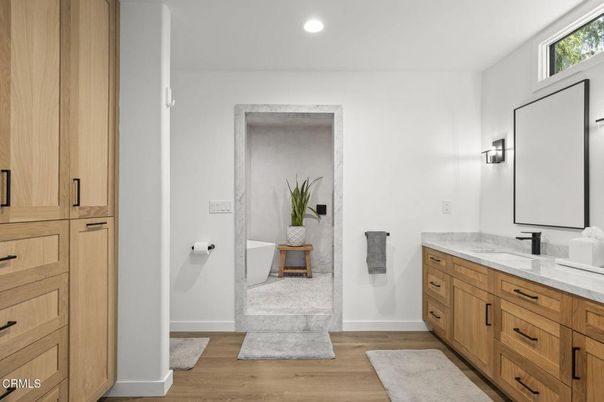 Bathroom, Dual Sink Vanities, Free Standing Baths, Interior, Recessed Lighting, Wood Texture Flooring