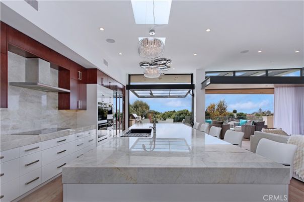 Chandelier, Interior, Kitchen, Pendant Lights, Recessed Lighting, Stainless Steel Appliances, Wood Texture Flooring