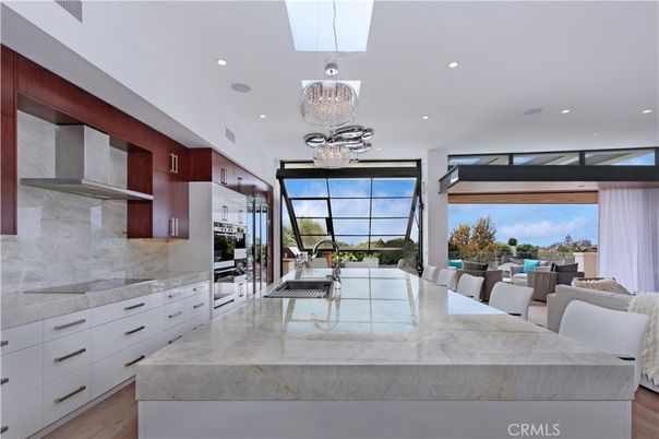 Chandelier, Interior, Kitchen, Pendant Lights, Recessed Lighting, Stainless Steel Appliances, Wood Texture Flooring