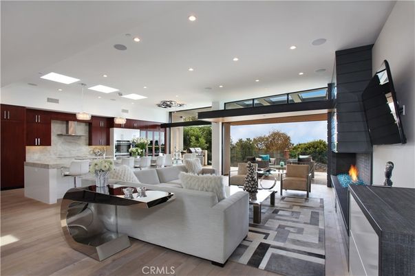Fireplace, Interior, Kitchen, Living room, Pendant Lights, Recessed Lighting, Stainless Steel Appliances, Wood Texture Flooring