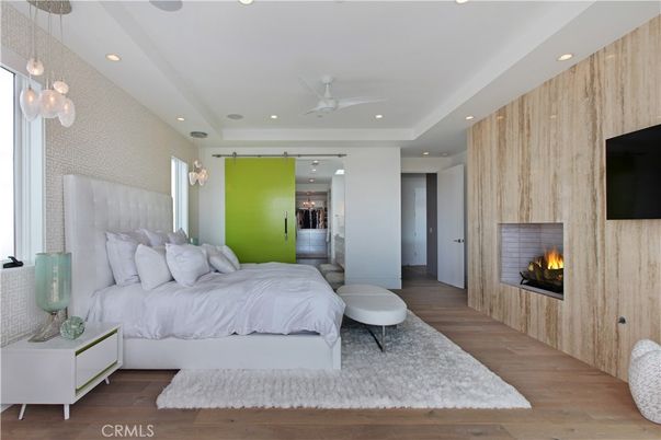 Bedroom, Fireplace, Interior, Pendant Lights, Recessed Lighting, Wood Texture Flooring