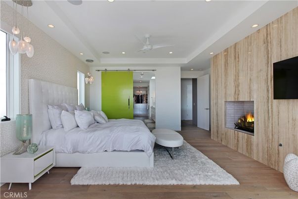 Bedroom, Fireplace, Interior, Pendant Lights, Recessed Lighting, Wood Texture Flooring