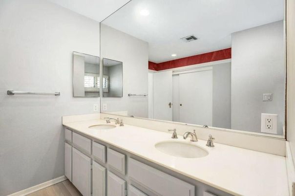 Bathroom, Dual Sink Vanities, Interior, Recessed Lighting, Wood Texture Flooring