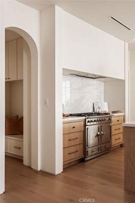 Interior, Kitchen, Marble Walls, Recessed Lighting, Stainless Steel Appliances, Wood Texture Flooring
