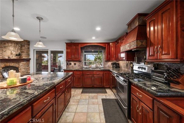 Interior, Kitchen, Pendant Lights, Recessed Lighting, Stainless Steel Appliances, Stone Walls
