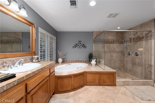 Bathroom, Dual Sink Vanities, Glass Shower, Interior, Recessed Lighting, Tile Countertops