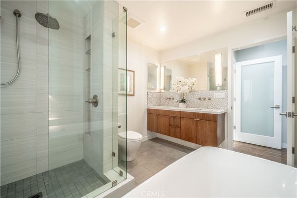 Bathroom, Dual Sink Vanities, Glass Shower, Interior, Recessed Lighting, Tile Countertops