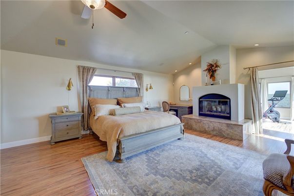Bedroom, Fireplace, Interior, Recessed Lighting, Wood Texture Flooring