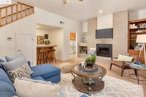 Fireplace, Interior, Living room, Recessed Lighting, Stone Walls, Wood Texture Flooring