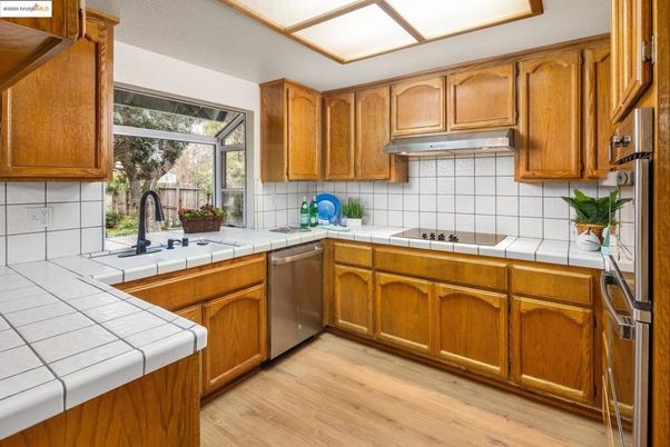 Interior, Kitchen, Tile Countertops, Wood Texture Flooring