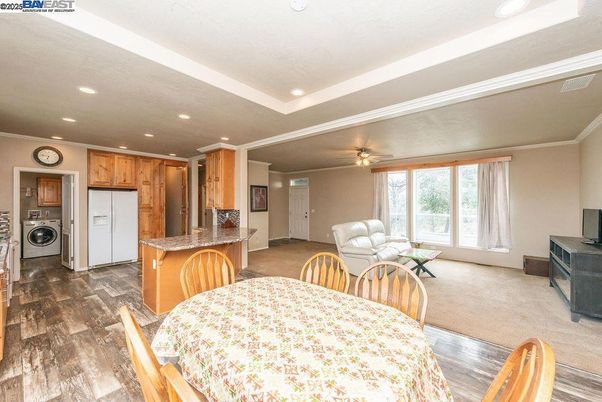 Interior, Kitchen, Recessed Lighting, Washer, Wood Texture Flooring