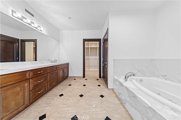 Bathroom, Dual Sink Vanities, Interior, Marble Walls, Recessed Lighting