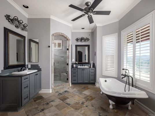 Bathroom, Dual Sink Vanities, Free Standing Baths, Glass Shower, Interior, Marble Walls, Recessed Lighting