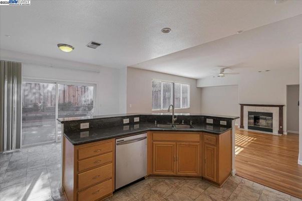 Fireplace, Interior, Kitchen, Recessed Lighting, Wood Texture Flooring