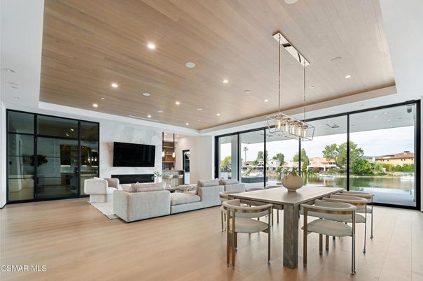 Dining room, Fireplace, Interior, Living room, Pendant Lights, Recessed Lighting, Wooden Ceilings, Wood Texture Flooring