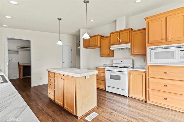 Interior, Kitchen, Pendant Lights, Recessed Lighting, Tile Countertops, Wood Texture Flooring