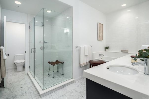 Bathroom, Dual Sink Vanities, Glass Shower, Interior, Marble, Recessed Lighting