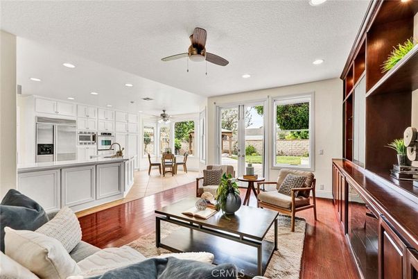 Dining room, Interior, Kitchen, Living room, Recessed Lighting, Stainless Steel Appliances, Wood Texture Flooring