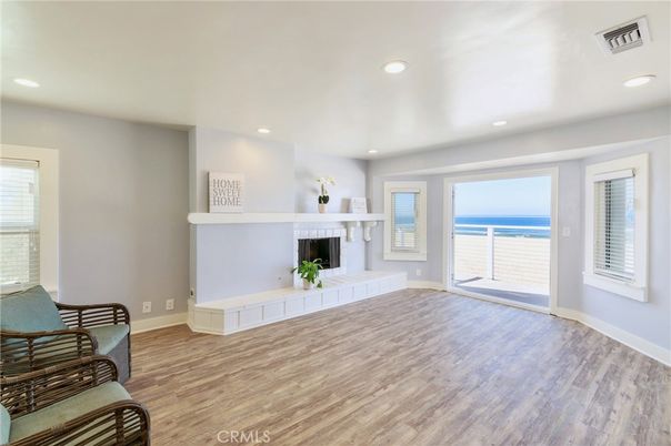 Fireplace, Interior, Recessed Lighting, Water, Wood Texture Flooring