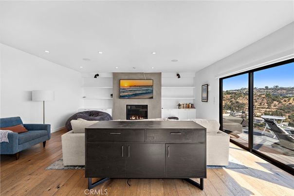 Fireplace, Interior, Living room, Recessed Lighting, Wood Texture Flooring