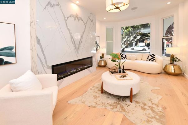 Fireplace, Interior, Living room, Marble Walls, Pendant Lights, Recessed Lighting, Wood Texture Flooring