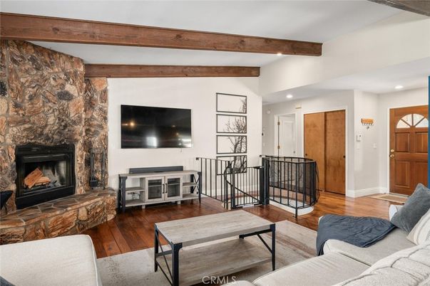 Fireplace, Interior, Living room, Recessed Lighting, Stone Walls, Wooden Beams, Wood Texture Flooring