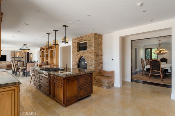 Chandelier, Dining room, Fireplace, Interior, Kitchen, Pendant Lights, Recessed Lighting, Stone Walls