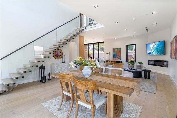 Dining room, Fireplace, Interior, Living room, Recessed Lighting, Wood Texture Flooring