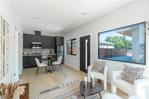 Dining room, Interior, Kitchen, Recessed Lighting, Stainless Steel Appliances, Wood Texture Flooring