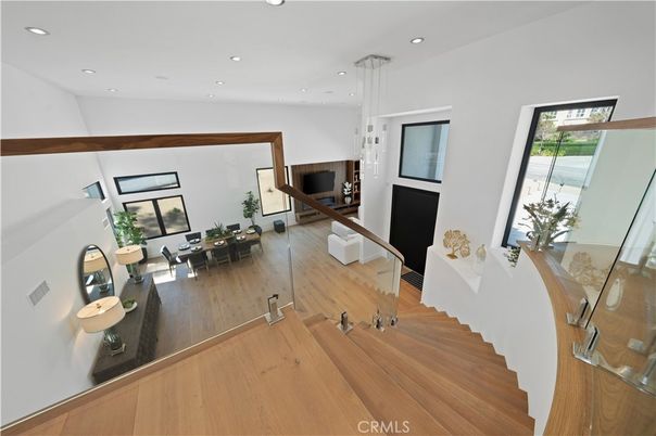 Dining room, Fireplace, Interior, Living room, Pendant Lights, Recessed Lighting, Wood Texture Flooring