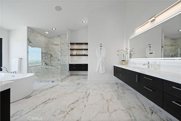 Bathroom, Dual Sink Vanities, Free Standing Baths, Glass Shower, Interior, Marble, Marble Walls, Recessed Lighting