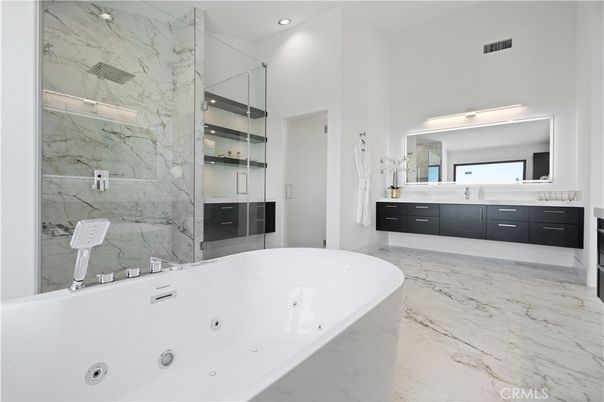 Bathroom, Dual Sink Vanities, Glass Shower, Interior, Marble, Marble Walls, Recessed Lighting