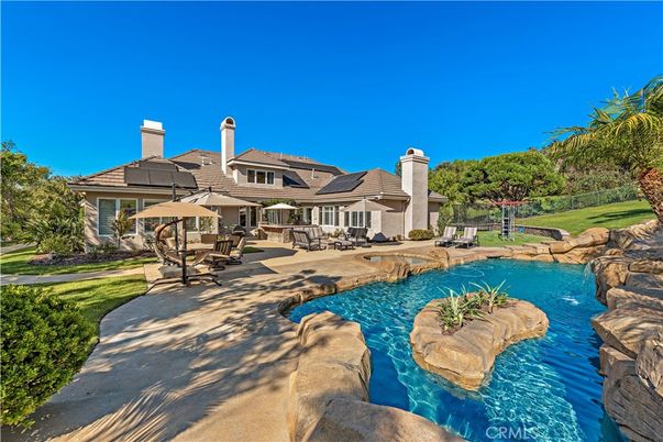 Exterior, Pool, Solar Panels