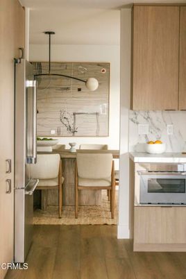 Dining room, Interior, Kitchen, Marble Walls, Stainless Steel Appliances, Wood Texture Flooring