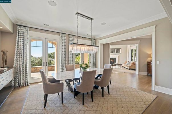 Chandelier, Dining room, Fireplace, Interior, Living room, Recessed Lighting, Wood Texture Flooring