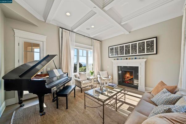 Fireplace, Interior, Living room, Piano, Recessed Lighting, Wood Texture Flooring