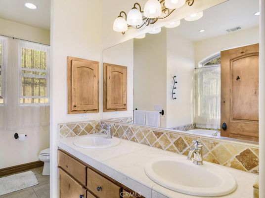 Bathroom, Dual Sink Vanities, Interior, Recessed Lighting, Tile Countertops
