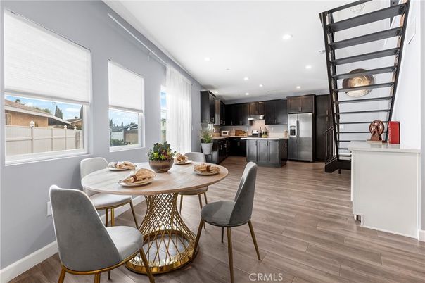 Dining room, Interior, Kitchen, Recessed Lighting, Stainless Steel Appliances, Wood Texture Flooring