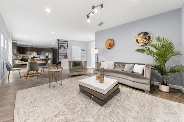 Dining room, Interior, Kitchen, Living room, Recessed Lighting, Stainless Steel Appliances, Wood Texture Flooring