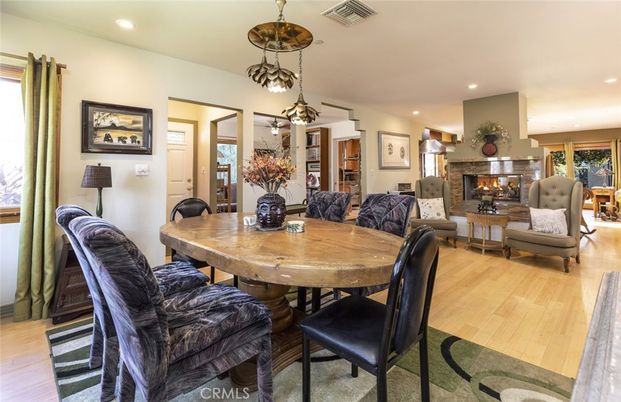 Dining room, Fireplace, Interior, Living room, Pendant Lights, Recessed Lighting, Wood Texture Flooring