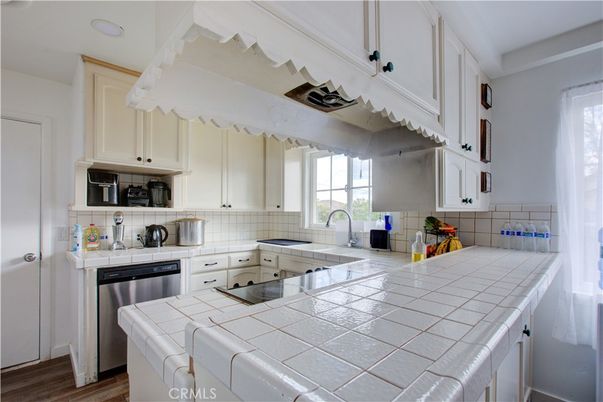 Interior, Kitchen, Tile Countertops, Wood Texture Flooring