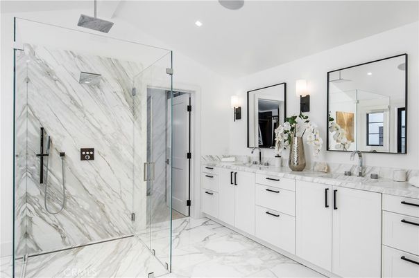 Bathroom, Dual Sink Vanities, Glass Shower, Interior, Marble, Marble Walls, Recessed Lighting