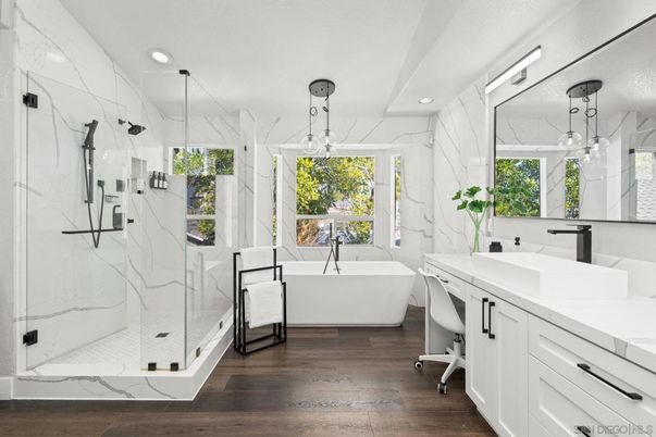 Bathroom, Free Standing Baths, Glass Shower, Interior, Marble Walls, Pendant Lights, Recessed Lighting, Wood Texture Flooring
